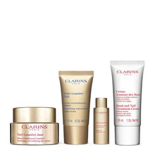 Load image into Gallery viewer, Clarins Nutri-Lumière Collection
